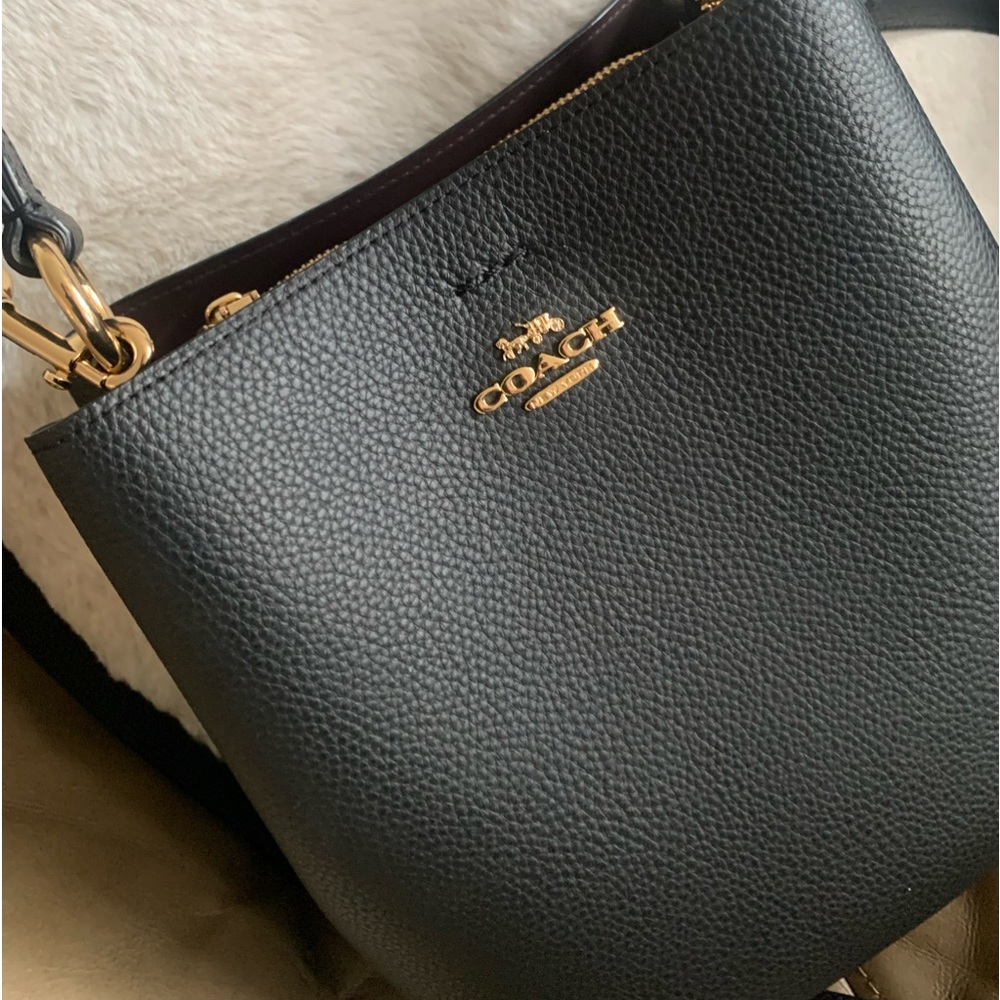 Coach leather bucket bag in excellent condition! 8x8 width and height!